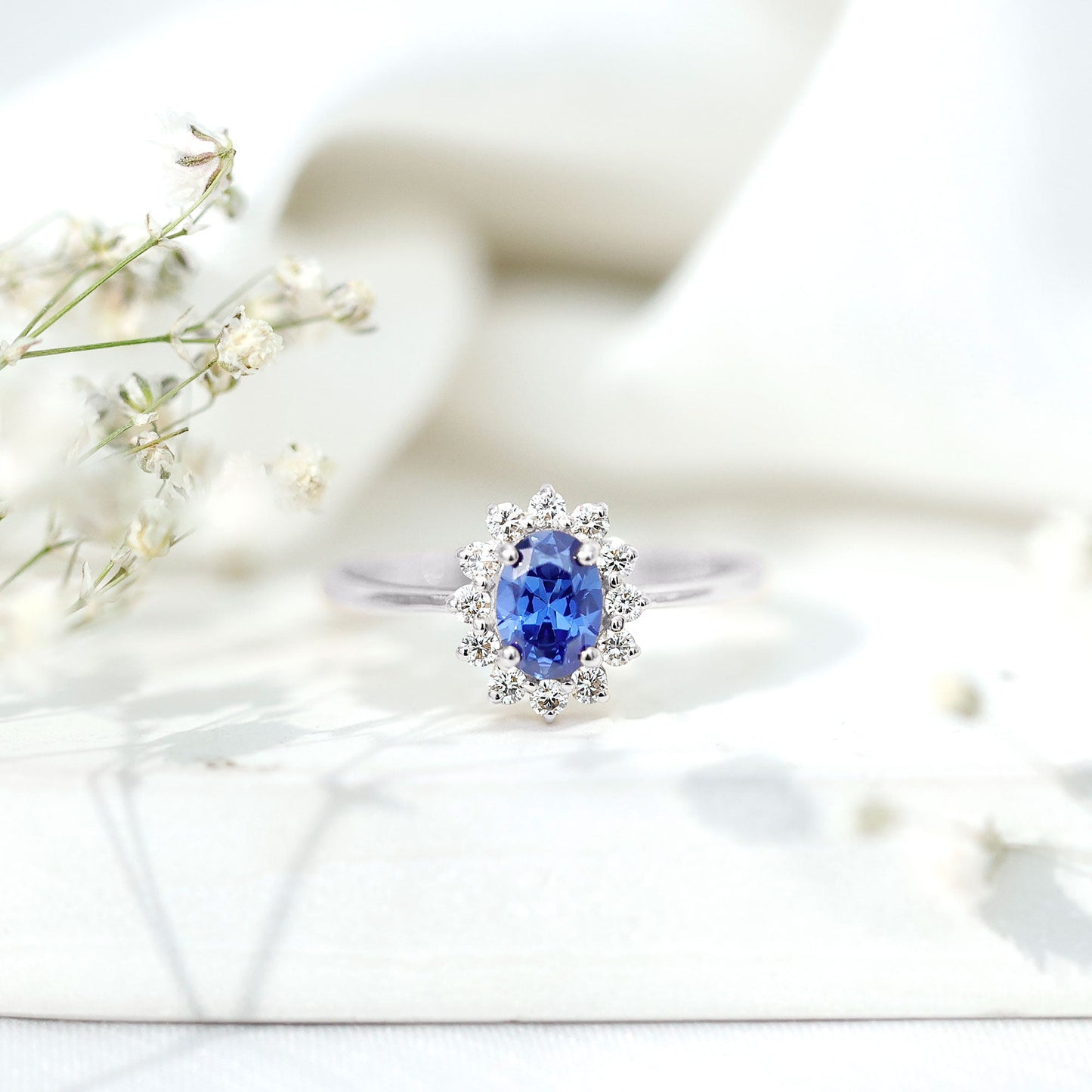 Certified 1 Carat Lab Grown Blue Sapphire Oval Engagement Ring with Diamond Halo