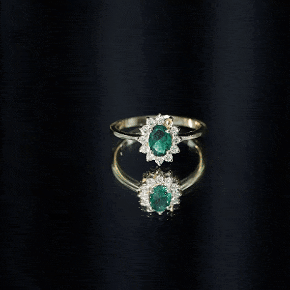 Lab Created Emerald Princess Diana Inspired Engagement Ring with Diamond