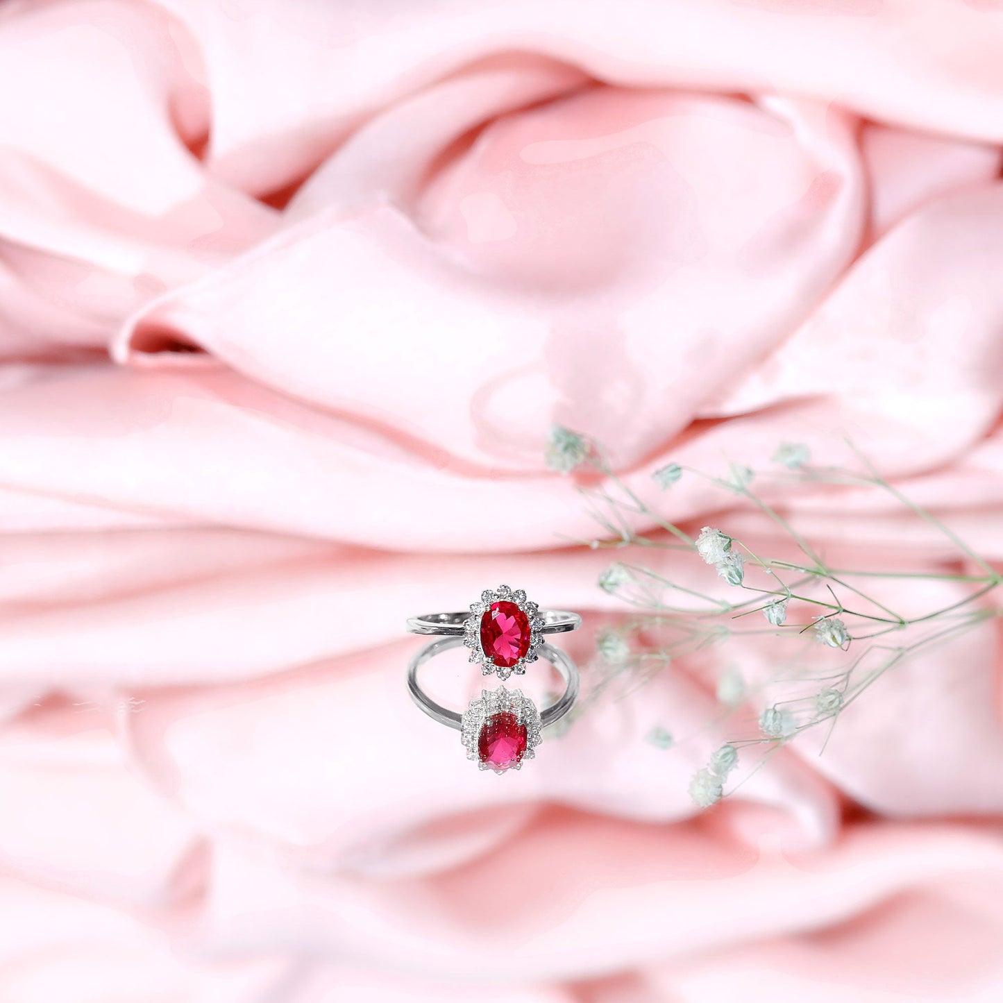 1.5 Carat Oval Shape Lab Grown Ruby and Diamond Halo Engagement Ring