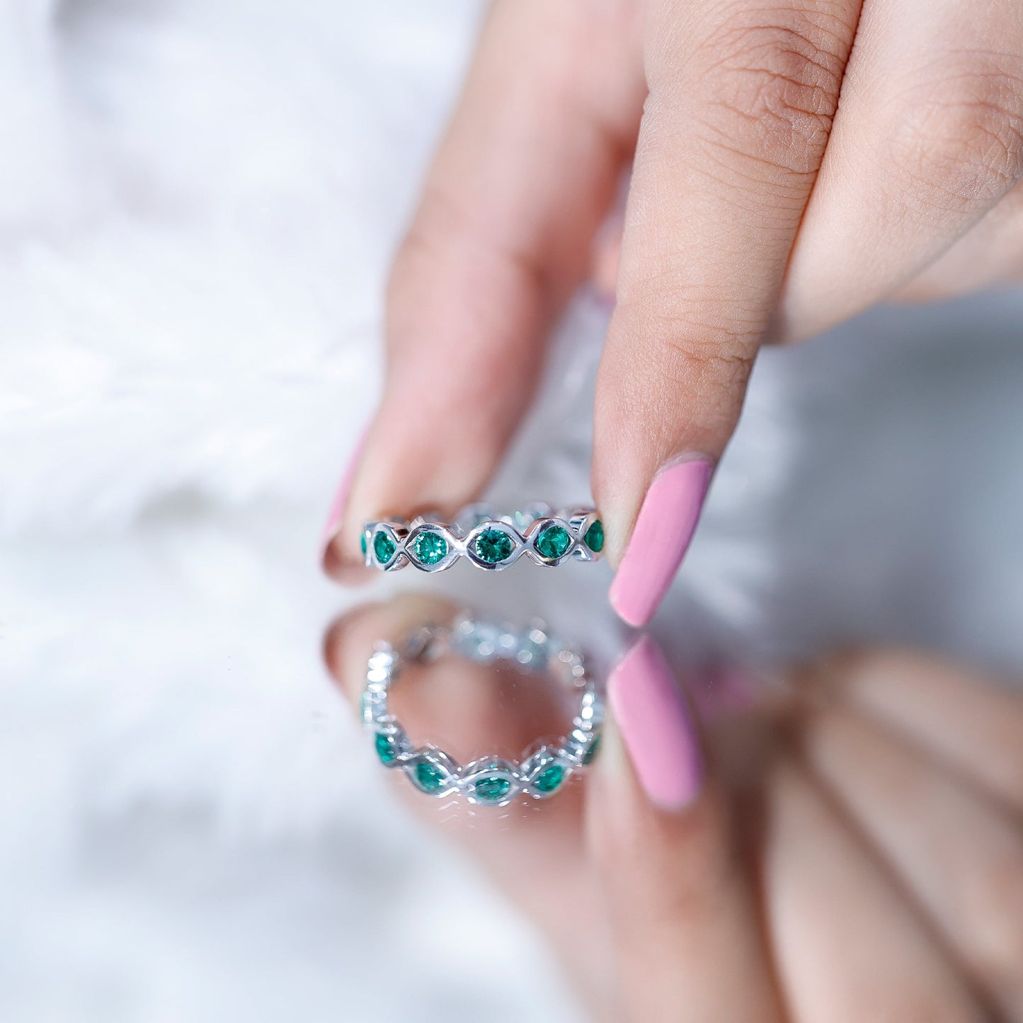 Certified Lab Grown Emerald Infinity Twisted Eternity Ring