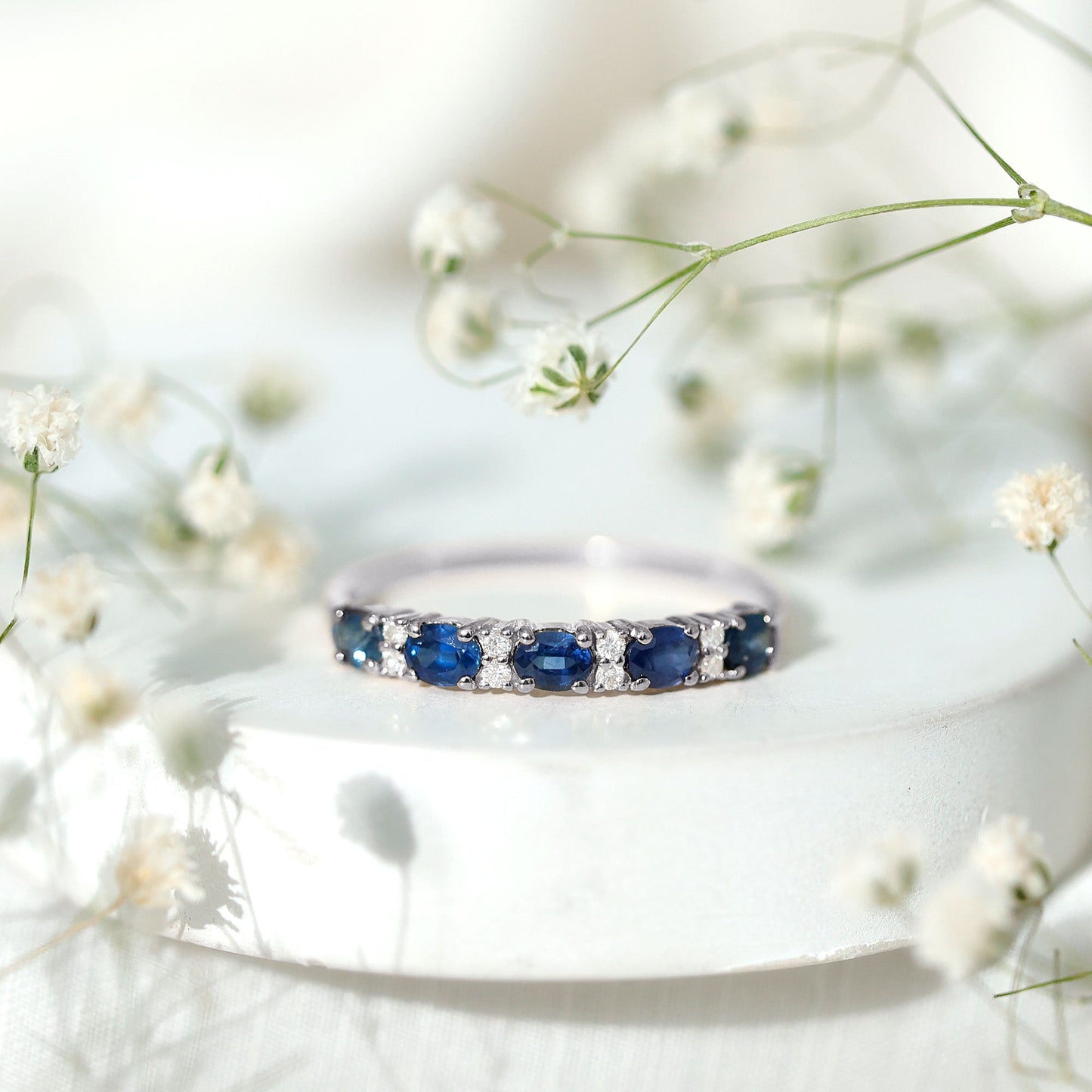 Natural 0.8 Carat Oval Blue Sapphire and Diamond Half Eternity Wedding Band