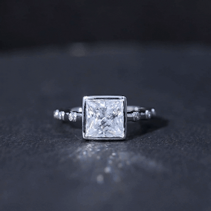 Bezel Set Moissanite Princess Cut Engagement Ring with Spaced Accent