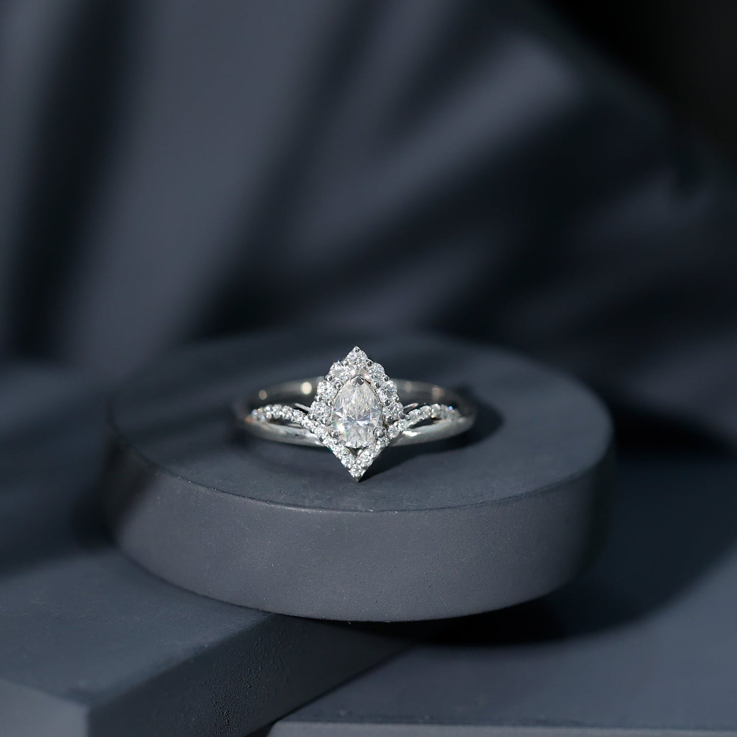 Designer 0.79 Carat Pear Shaped Moissanite Engagement Ring