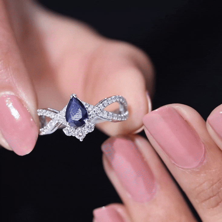Real 0.5 Blue Sapphire Pear Shape Engagement Ring with Diamond Crossover