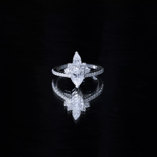 0.7 Carat Pear Shape Moissanite Crown Engagement Ring