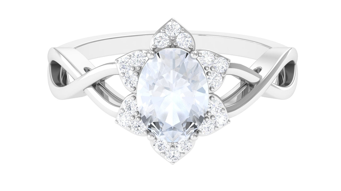 0.6 Carat Oval Cut Solitaire Moonstone and Diamond Floral Halo Ring