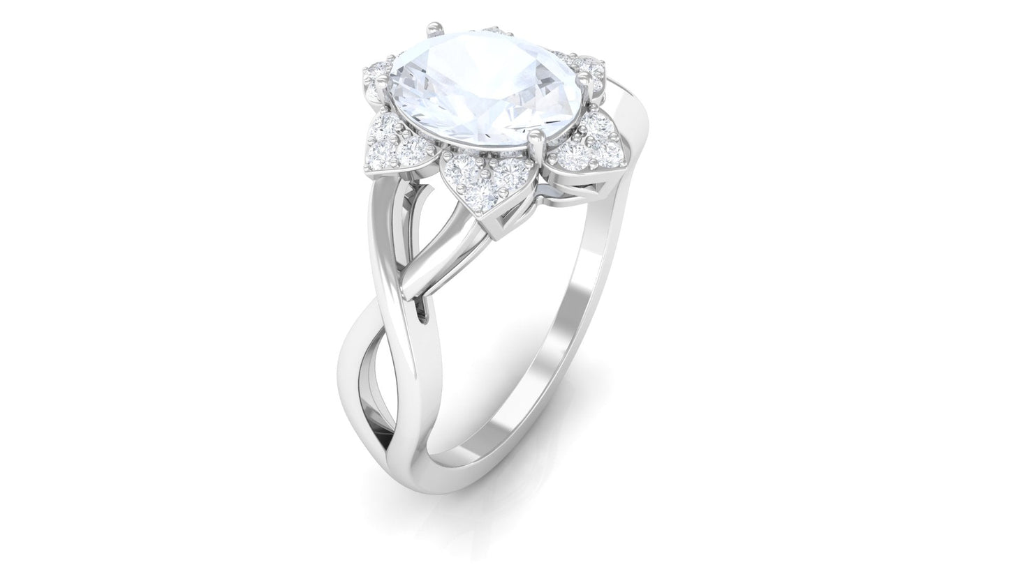 0.6 Carat Oval Cut Solitaire Moonstone and Diamond Floral Halo Ring