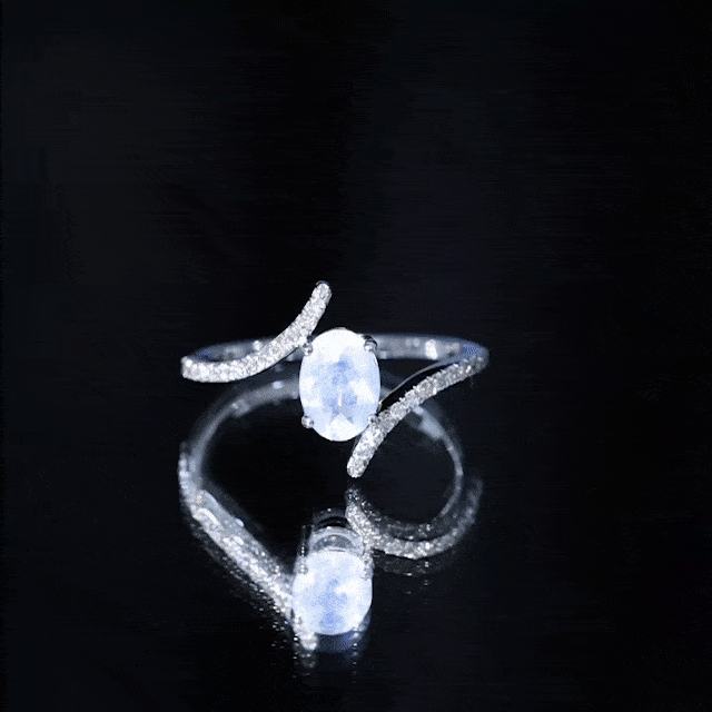 Oval Moonstone and Diamond Bypass Engagement Ring
