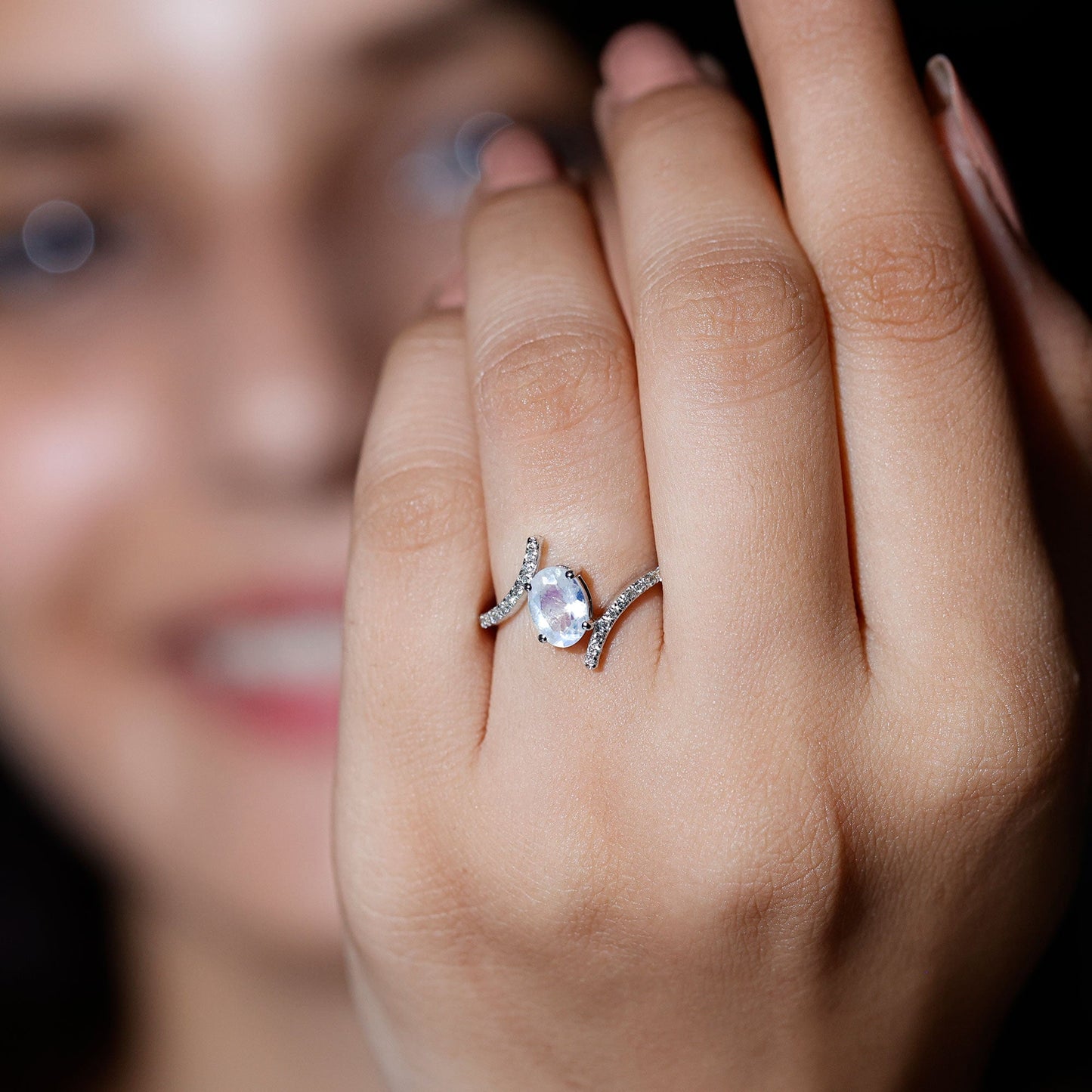 Oval Moonstone and Diamond Bypass Engagement Ring