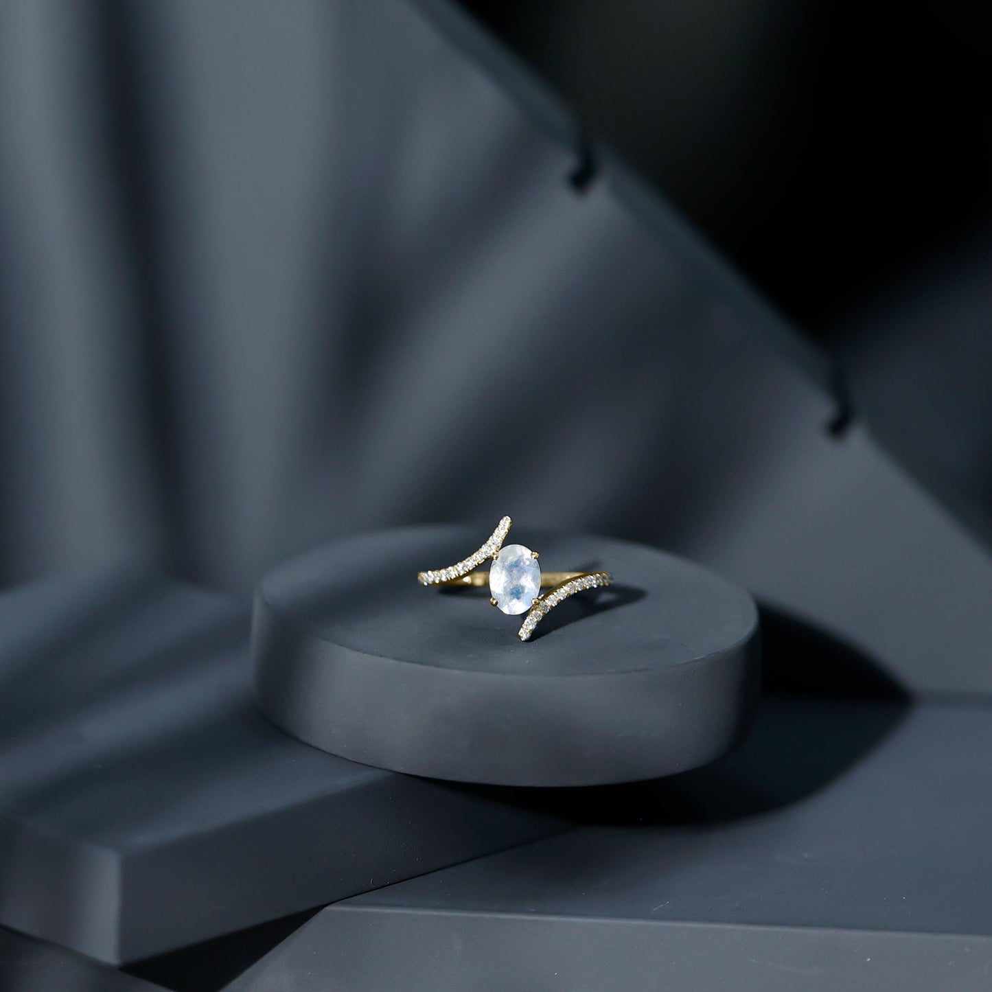Oval Moonstone and Diamond Bypass Engagement Ring