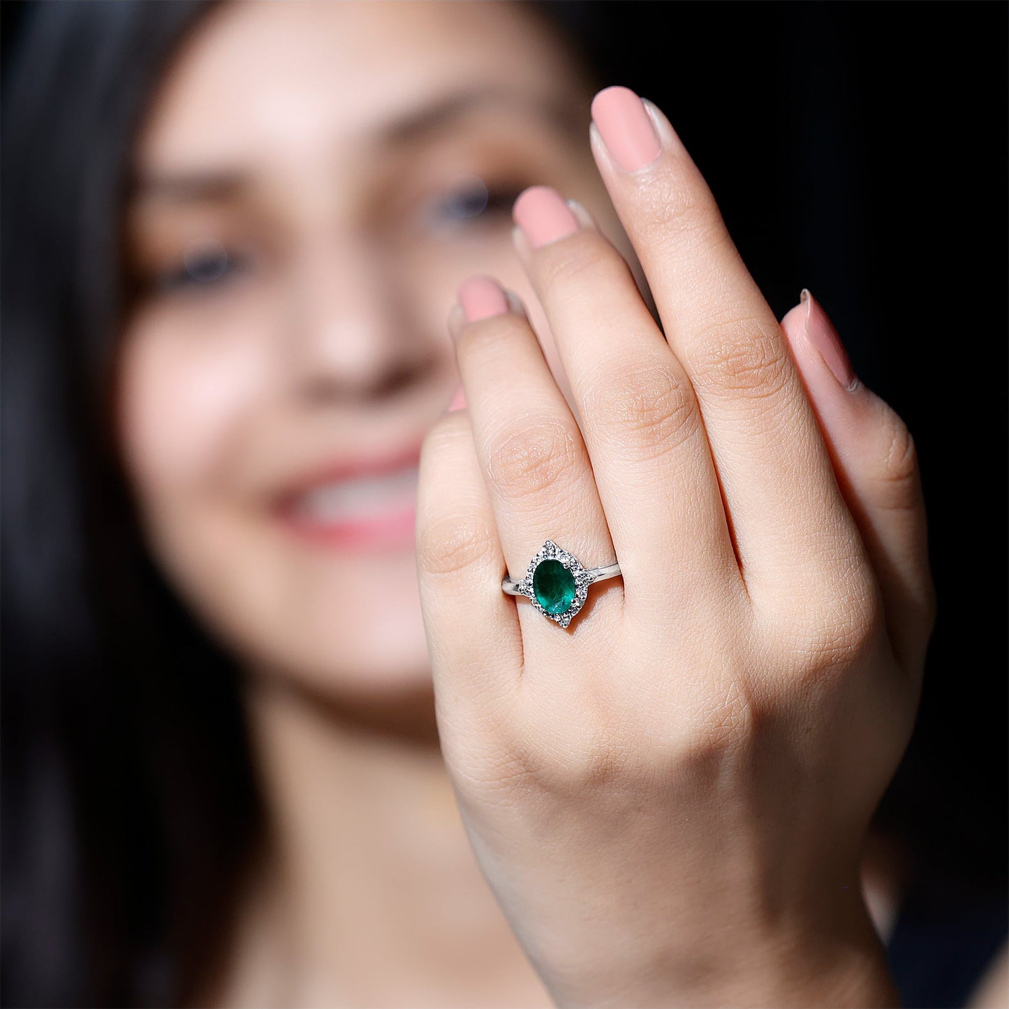 Vintage Looking Emerald Oval Engagement Ring with Diamond Halo
