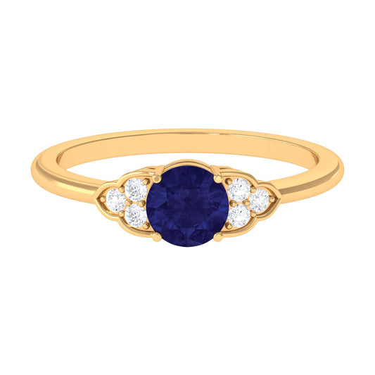 Round 0.9 Carat Blue Sapphire Engagement Ring with Diamond Trio