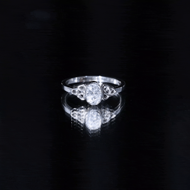 Oval Moissanite Solitaire Celtic Knot Ring in Bezel Setting