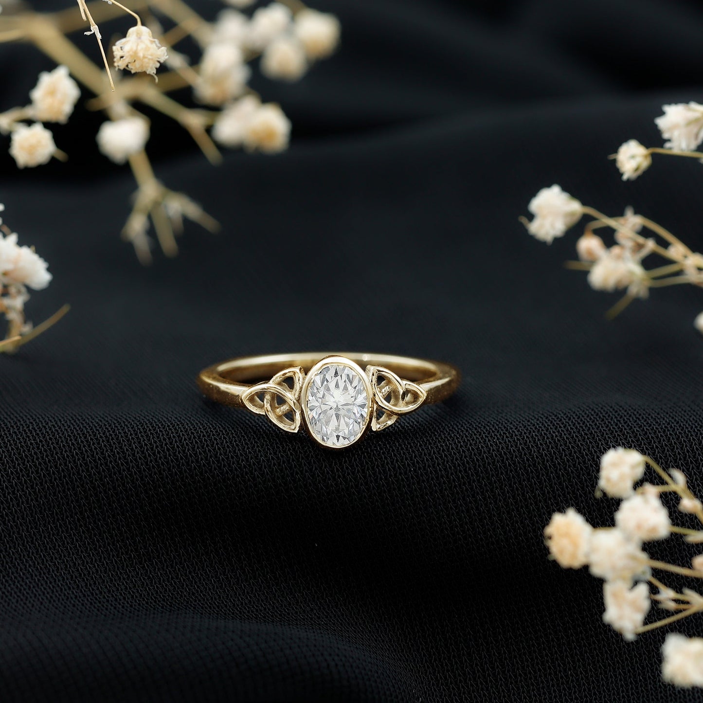 Oval Moissanite Solitaire Celtic Knot Ring in Bezel Setting
