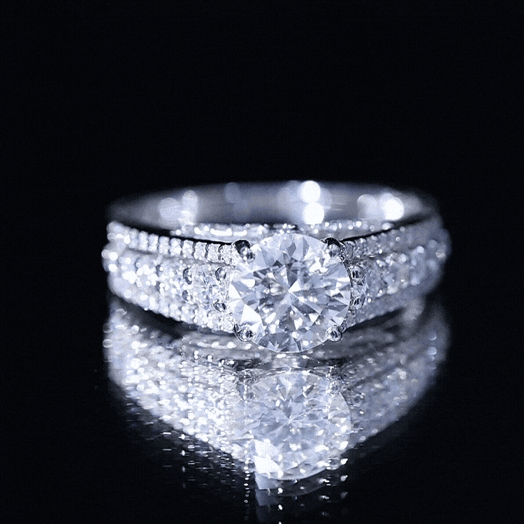 Round Brilliant Cut Moissanite Side Stone Engagement Ring
