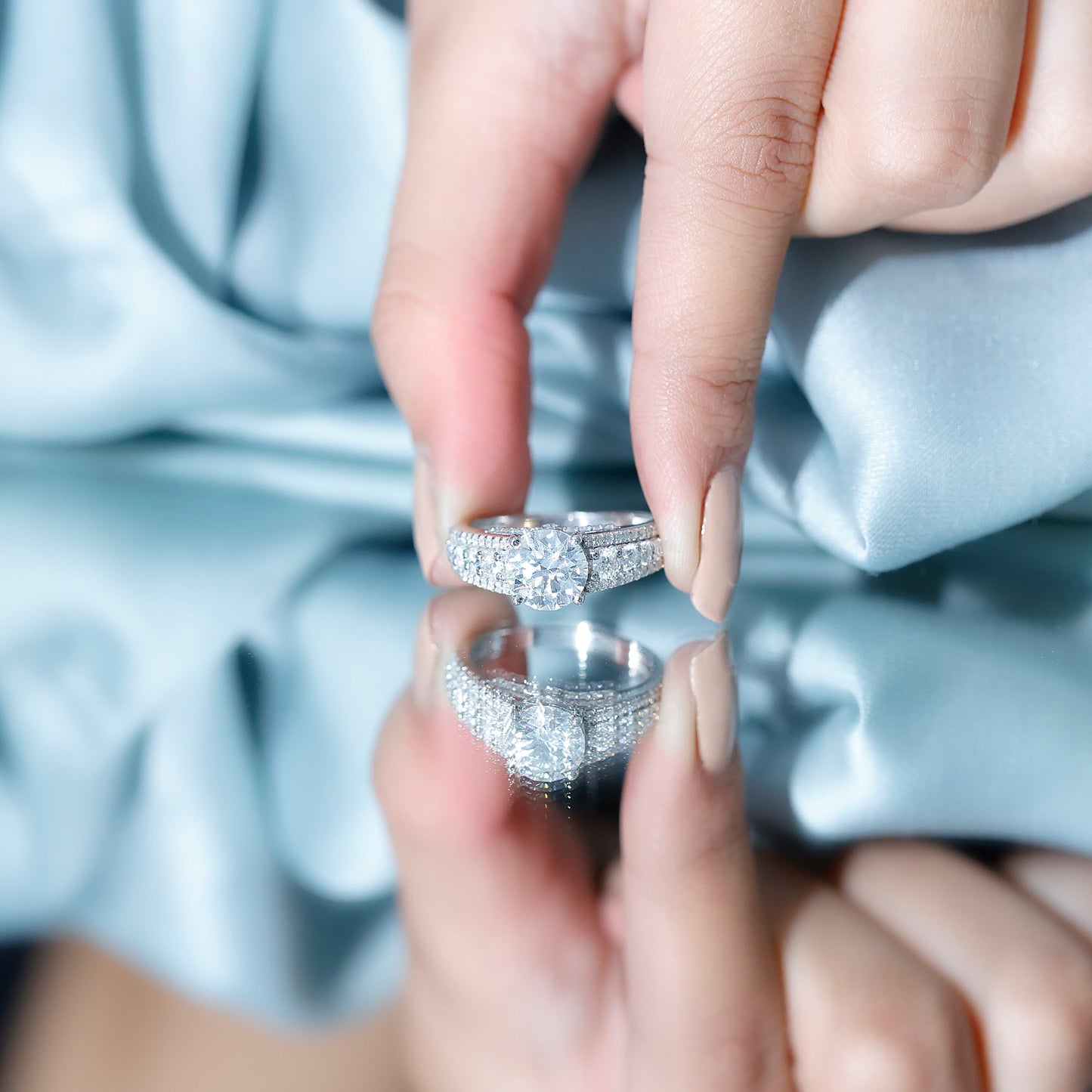 Round Brilliant Cut Moissanite Side Stone Engagement Ring