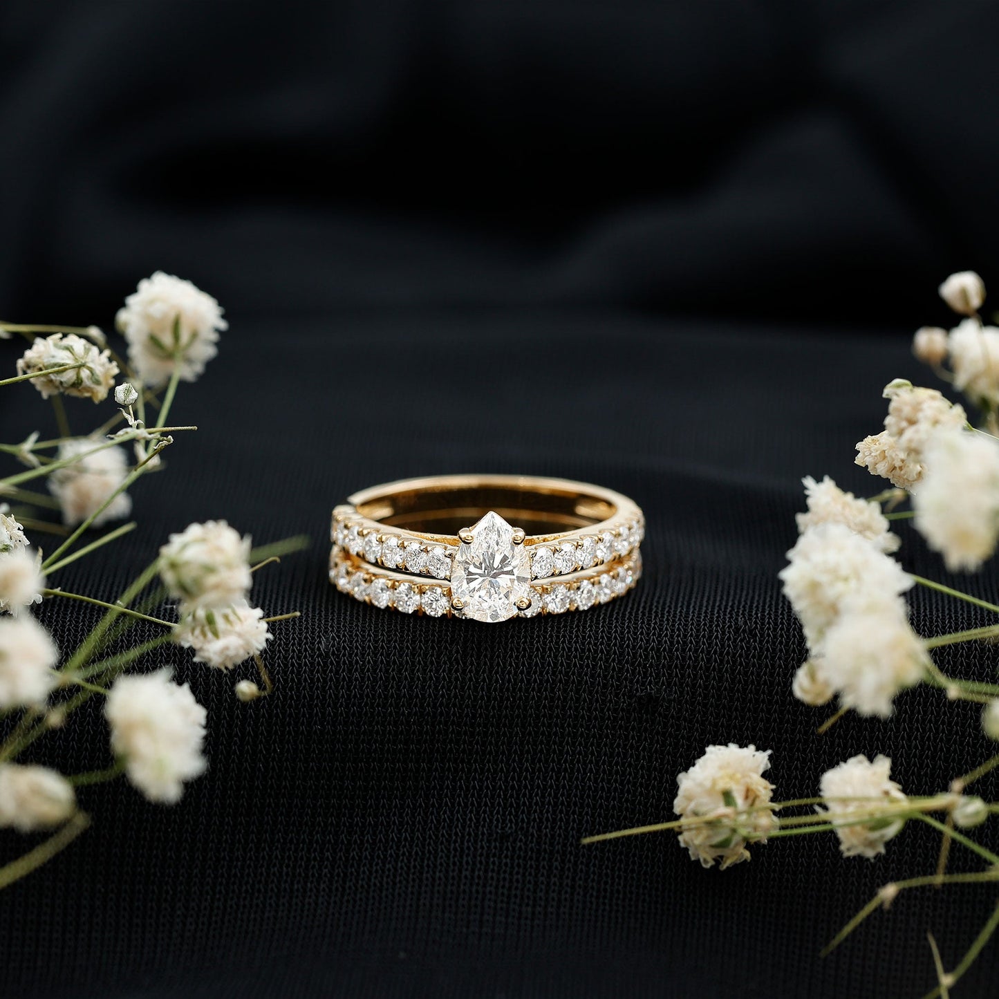 Pear Shaped Moissanite Engagement Ring with Wedding Band