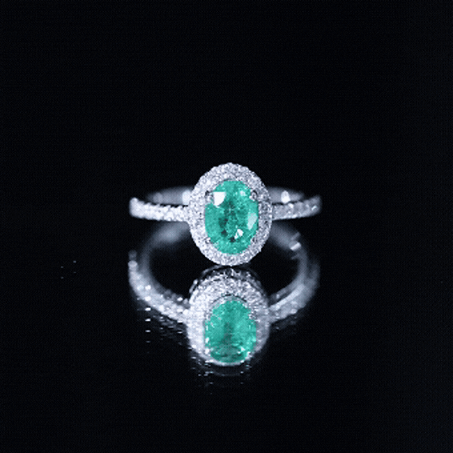 Real 0.7 Carat Oval Emerald Engagement Ring with Diamond Halo