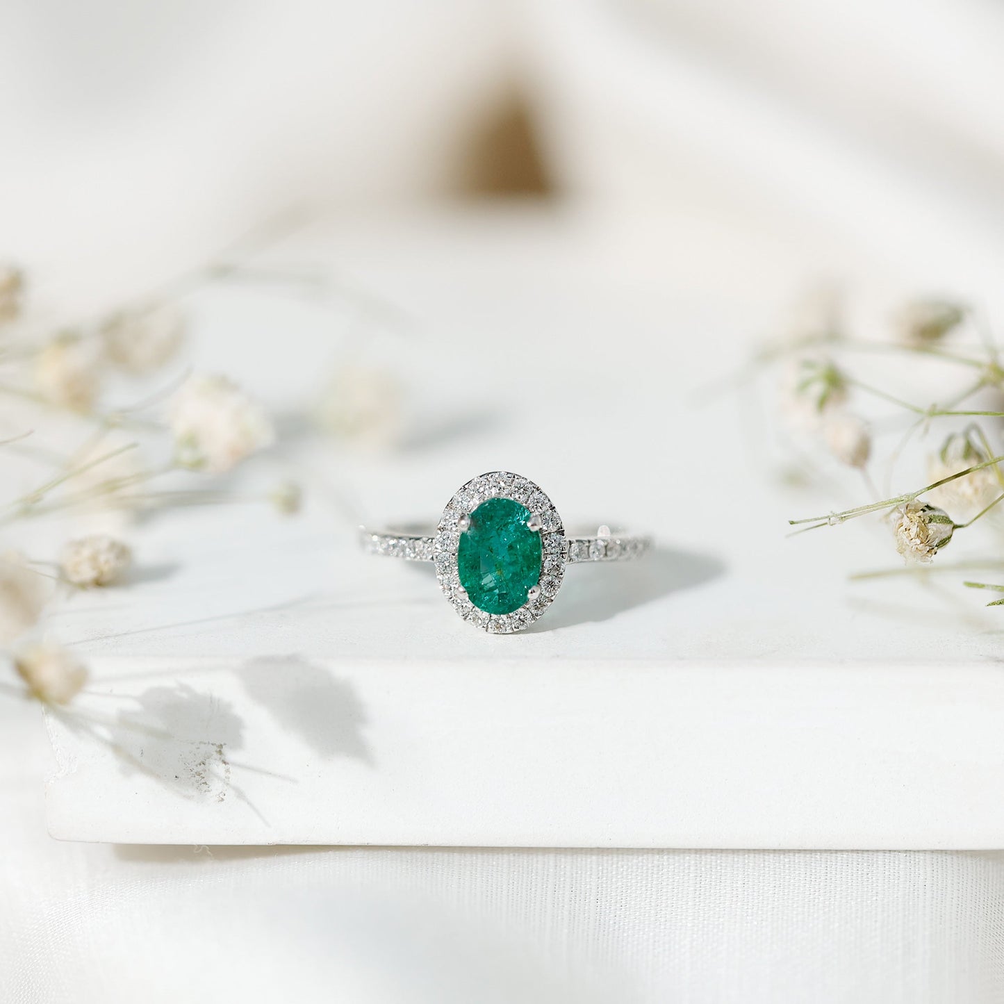 Real 0.7 Carat Oval Emerald Engagement Ring with Diamond Halo