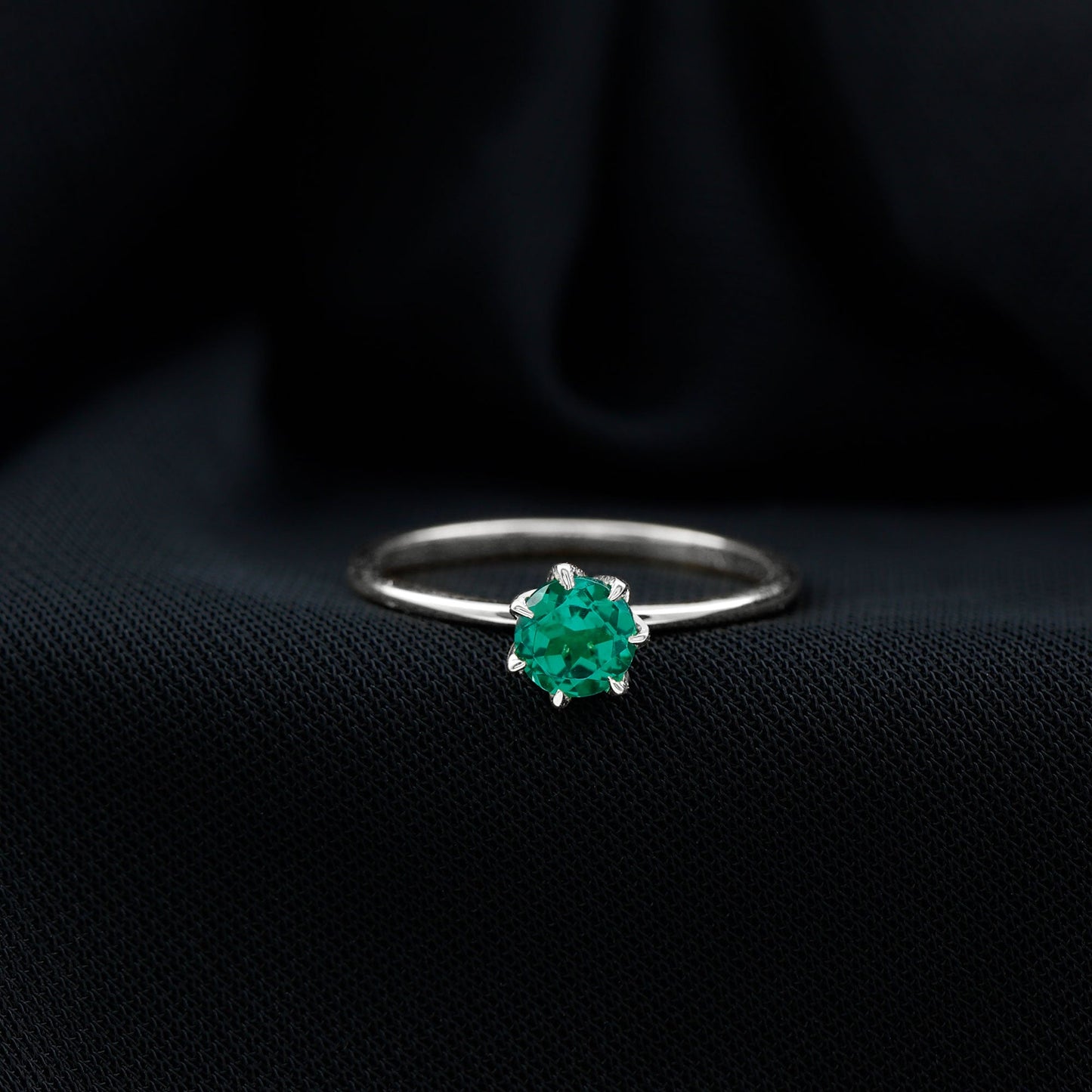 0.8 Carat Round Lab Grown Emerald Solitaire Ring in Lotus Basket Setting