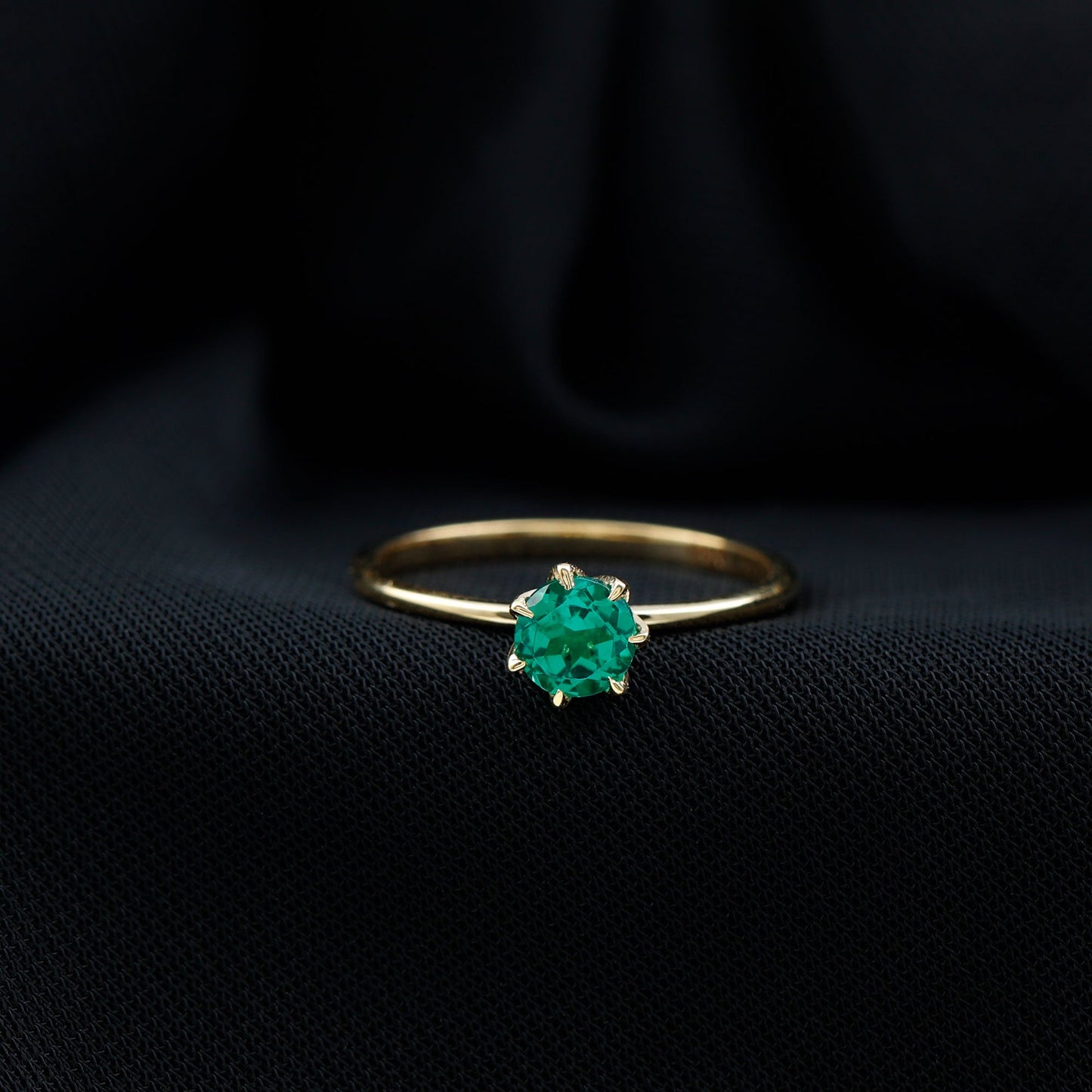 0.8 Carat Round Lab Grown Emerald Solitaire Ring in Lotus Basket Setting