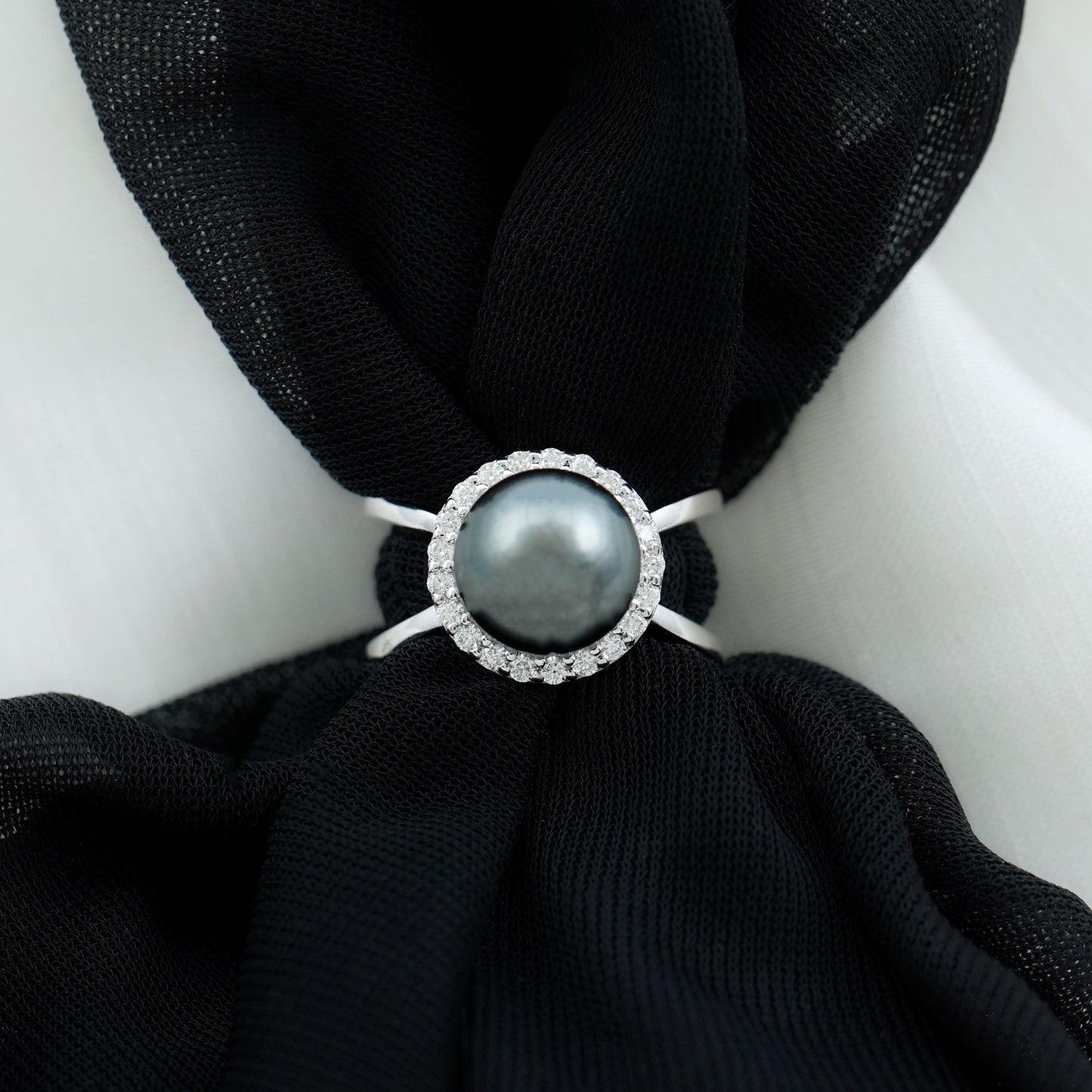 7.5 Carat Black Pearl Criss Cross Engagement Ring with Diamond Halo