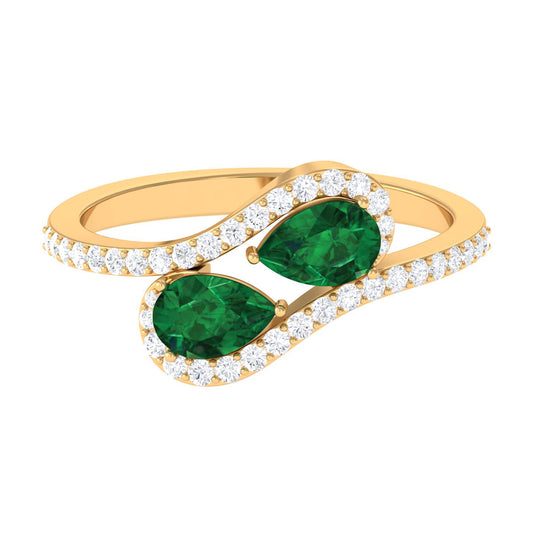 Pear Shape Created Emerald and Diamond Bypass Engagement Ring