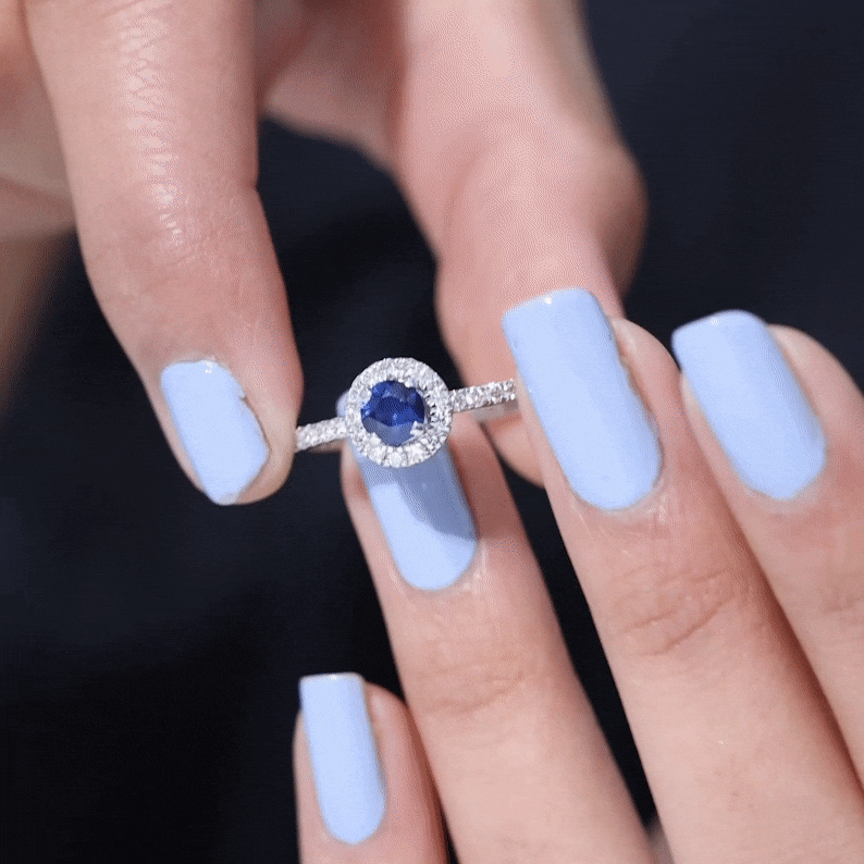 Minimal 0.9 Carat Blue Sapphire Engagement Ring with Diamond Halo