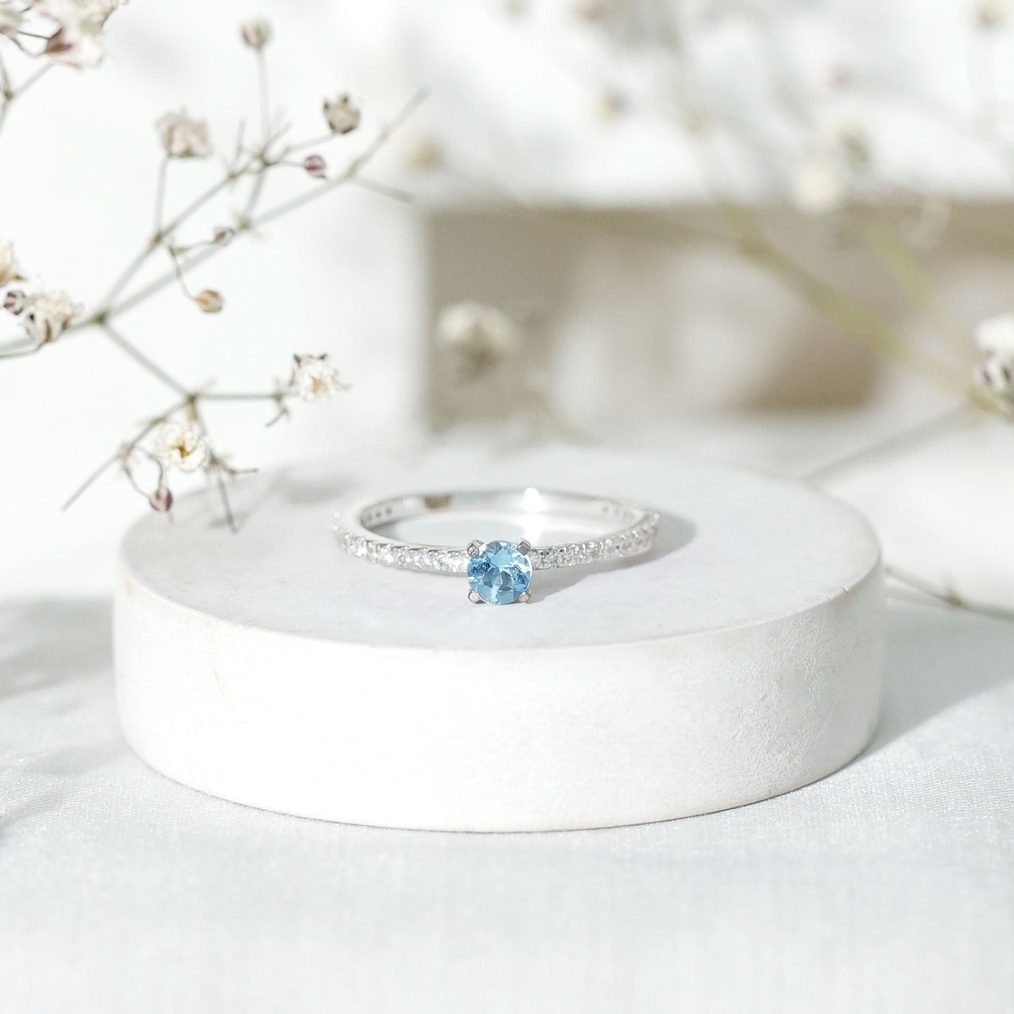 Real Aquamarine Solitaire Ring with Diamond Side Stones