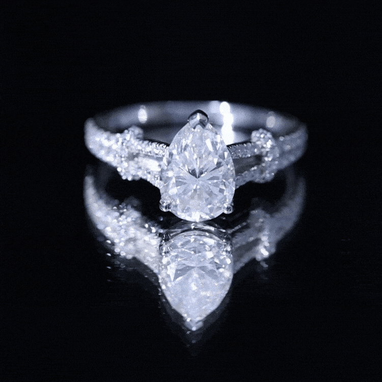 Pear Shaped Moissanite Solitaire Engagement Ring in Split Shank