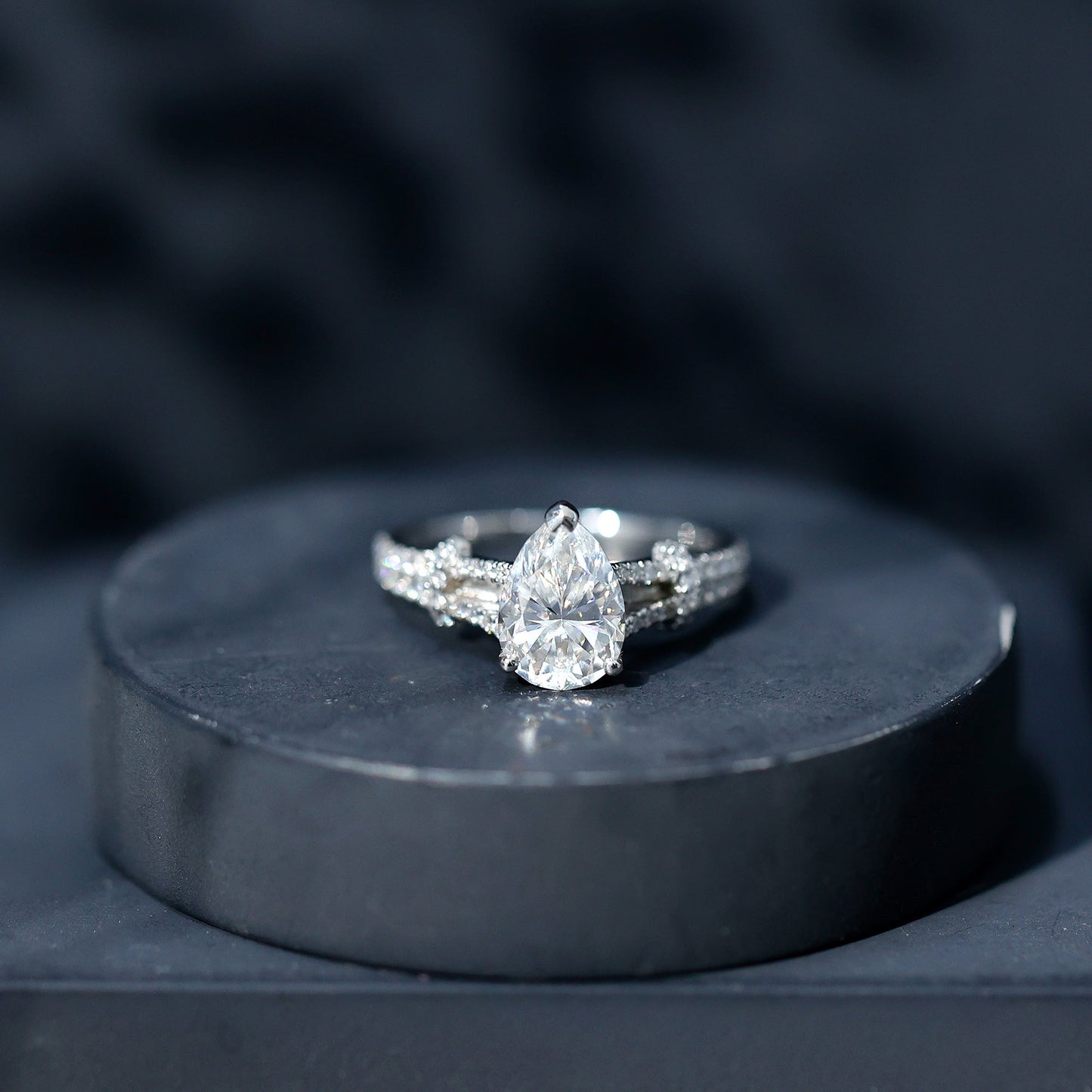Pear Shaped Moissanite Solitaire Engagement Ring in Split Shank