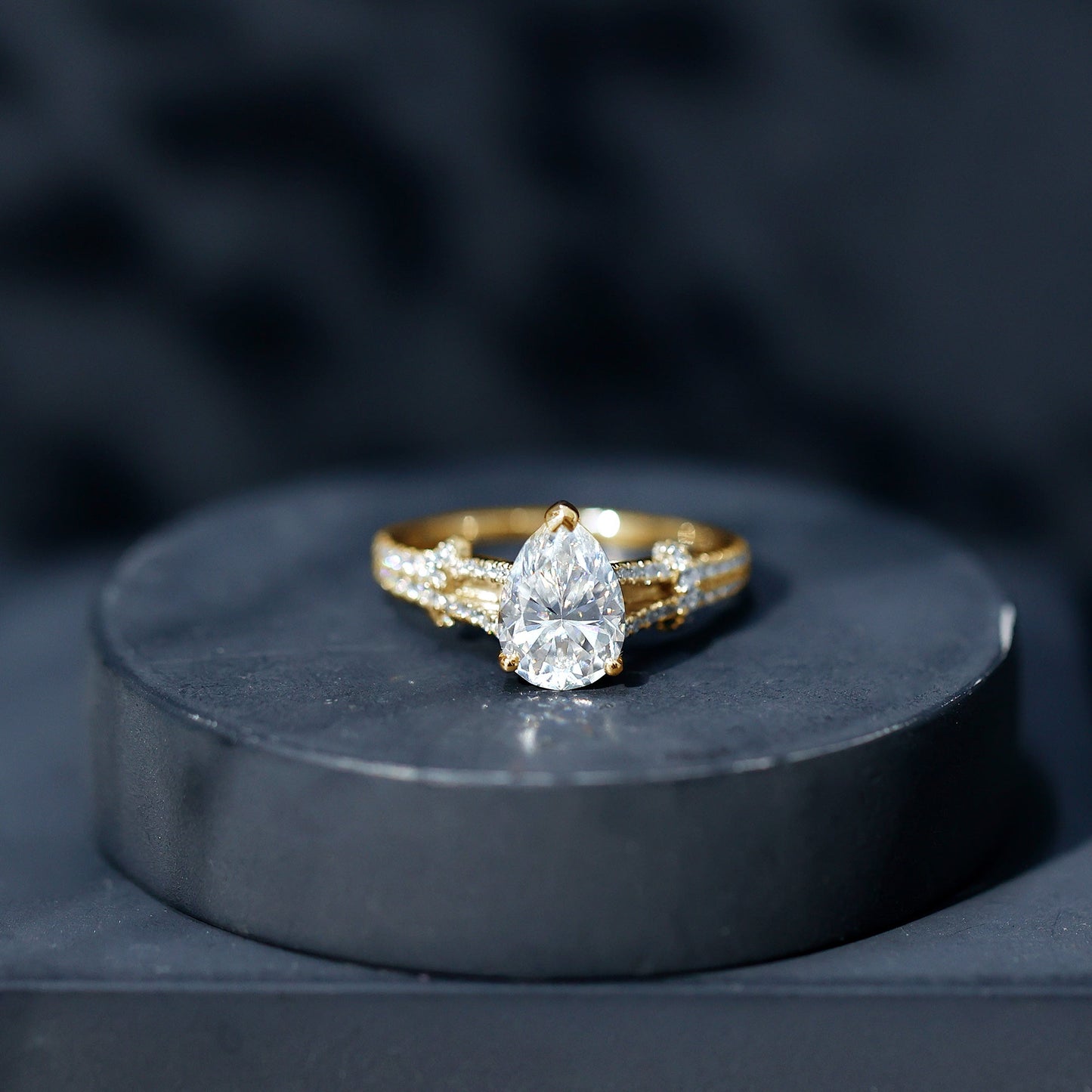 Pear Shaped Moissanite Solitaire Engagement Ring in Split Shank