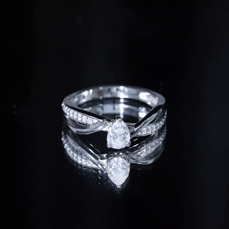 Pear Shaped Moissanite Infinity Engagement Ring