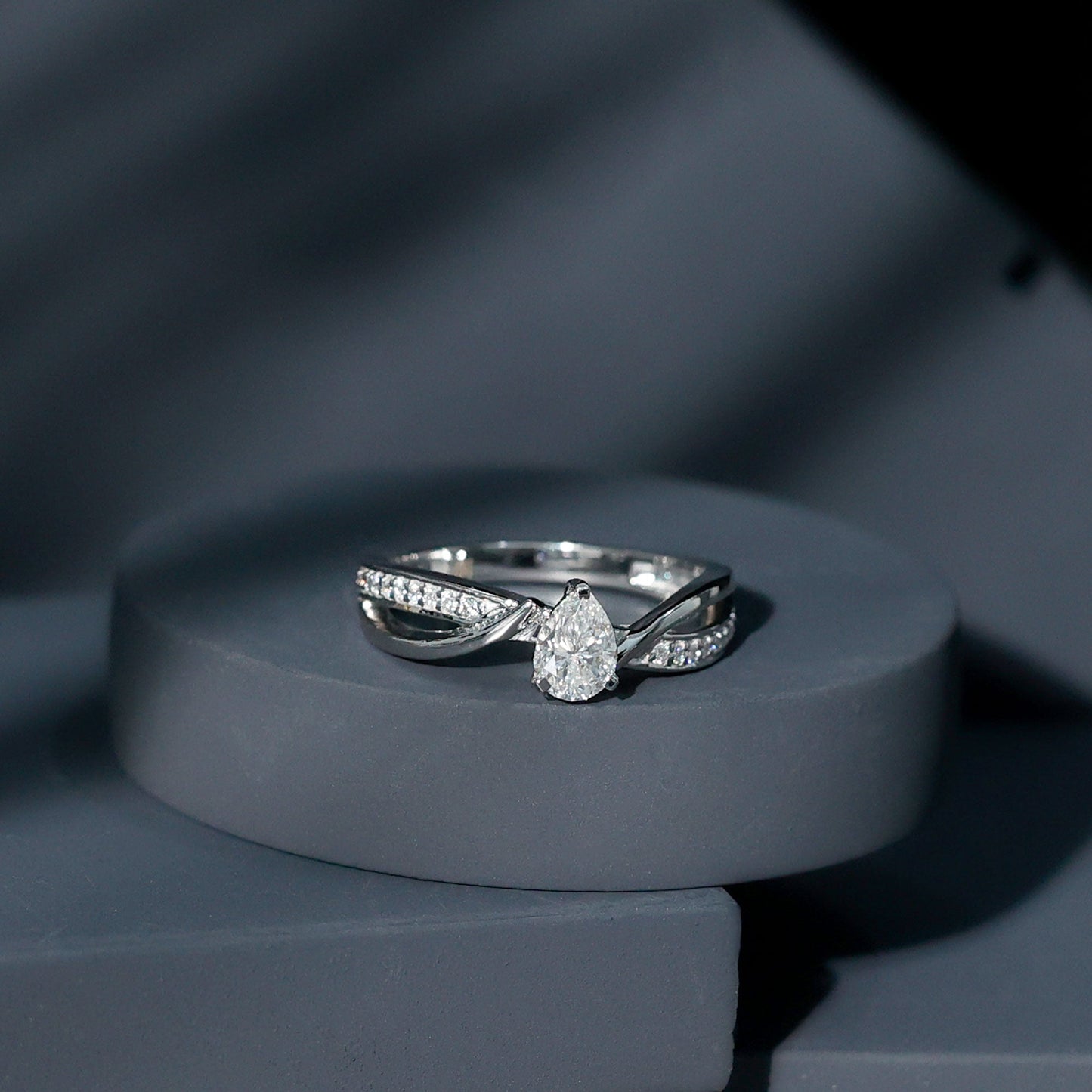 Pear Shaped Moissanite Infinity Engagement Ring