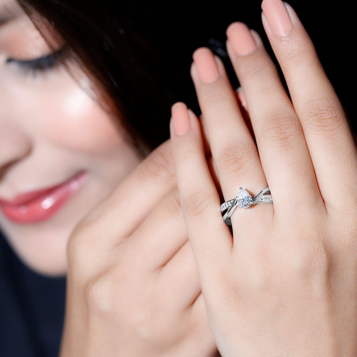 Pear Shaped Moissanite Infinity Engagement Ring