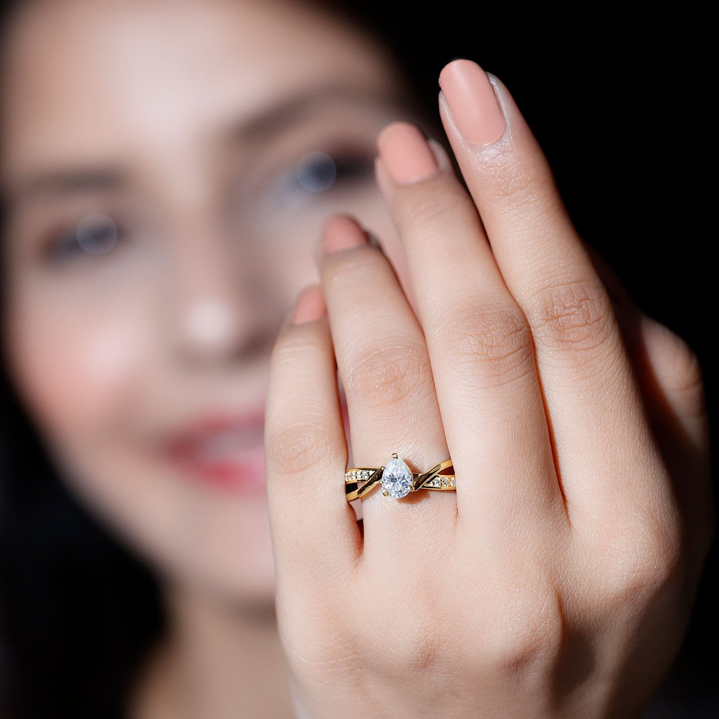 Pear Shaped Moissanite Infinity Engagement Ring