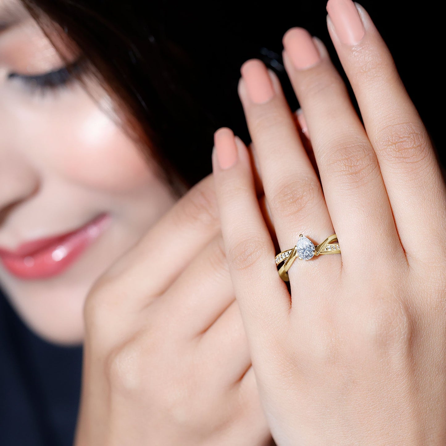 Pear Shaped Moissanite Infinity Engagement Ring