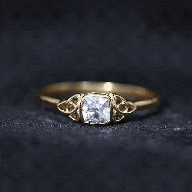 Brilliant Cut Moissanite Celtic Knot Engagement Ring in Bezel Setting