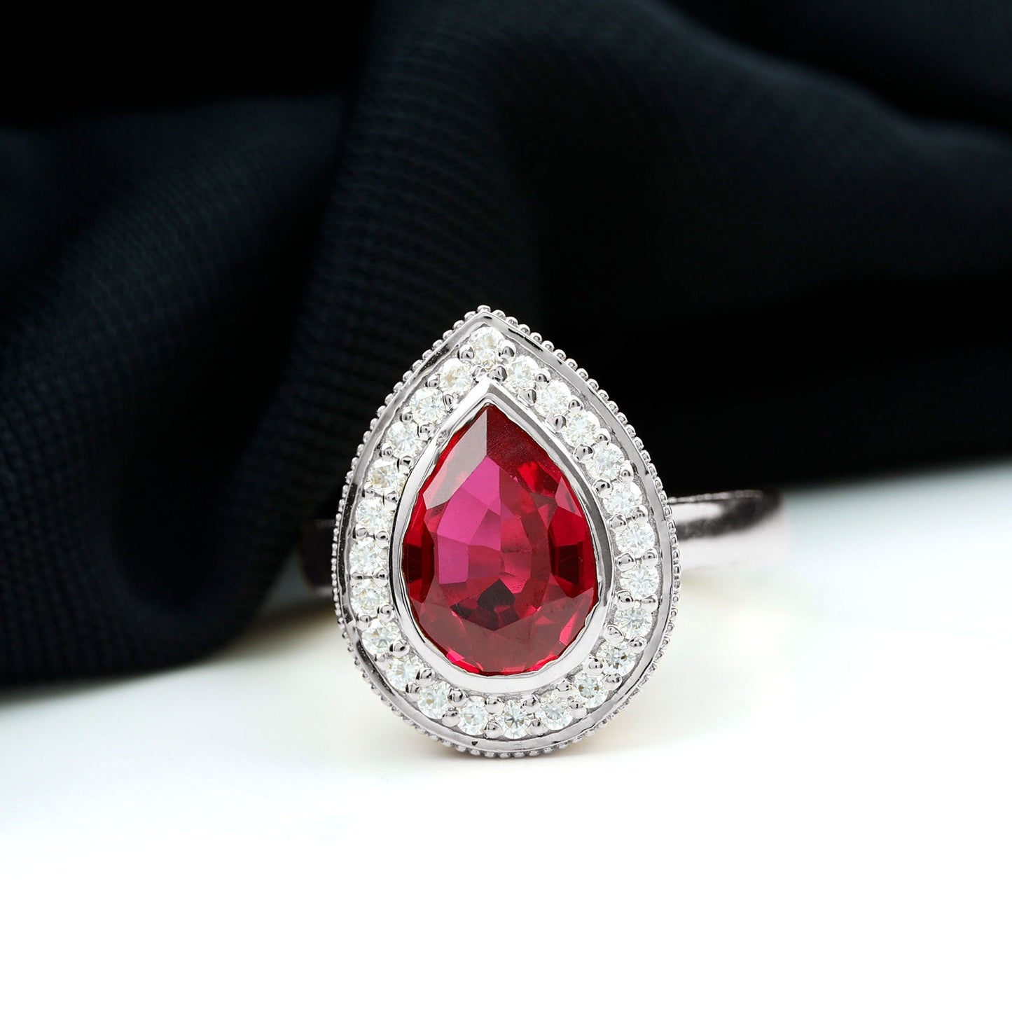 2.9 Carat Lab Created Ruby Teardrop Engagement Ring with Diamond Halo