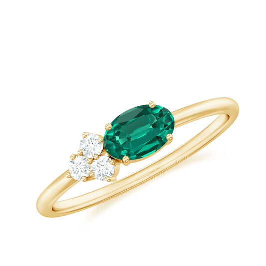 East West Style Oval Lab Grown Emerald Promise Ring with Diamond Trio