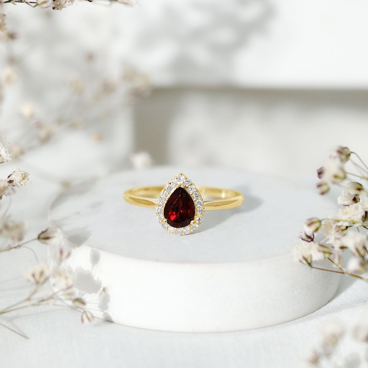 Classic Garnet Teardrop Engagement Ring with Diamond Halo