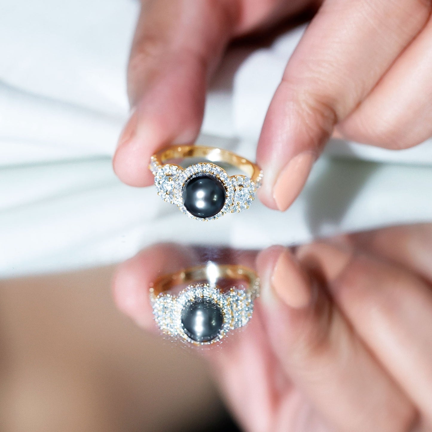 7.5 Carat Round Black Pearl Engagement Ring with Moissanite Accent