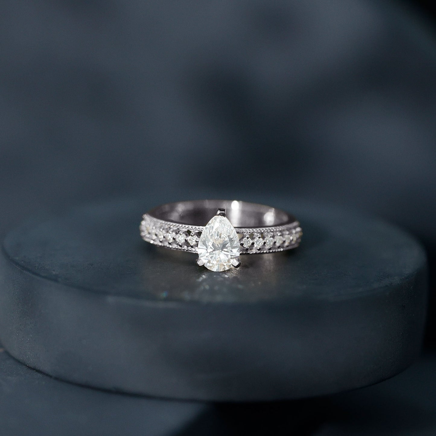 Pear Shaped Moissanite Solitaire Engagement Ring with Beaded Design