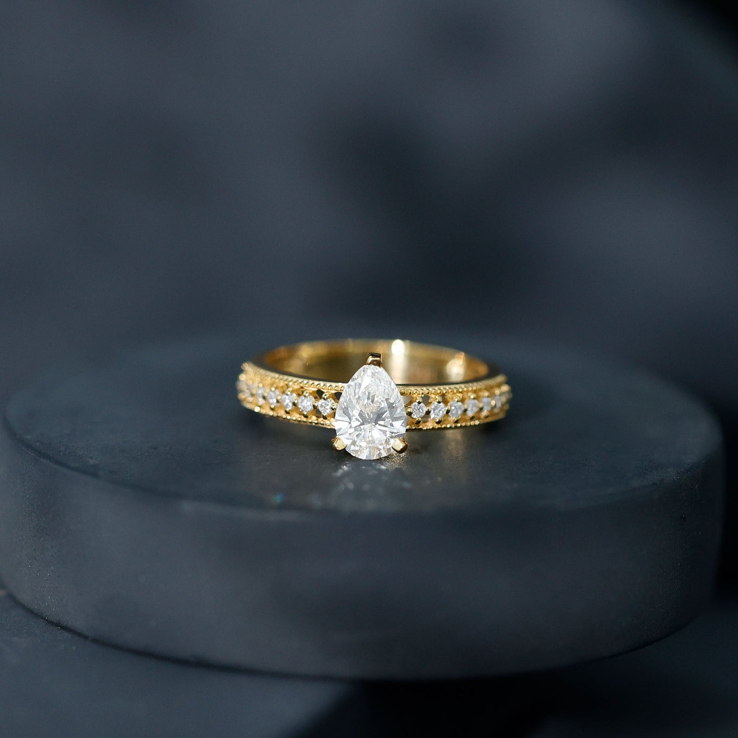 Pear Shaped Moissanite Solitaire Engagement Ring with Beaded Design