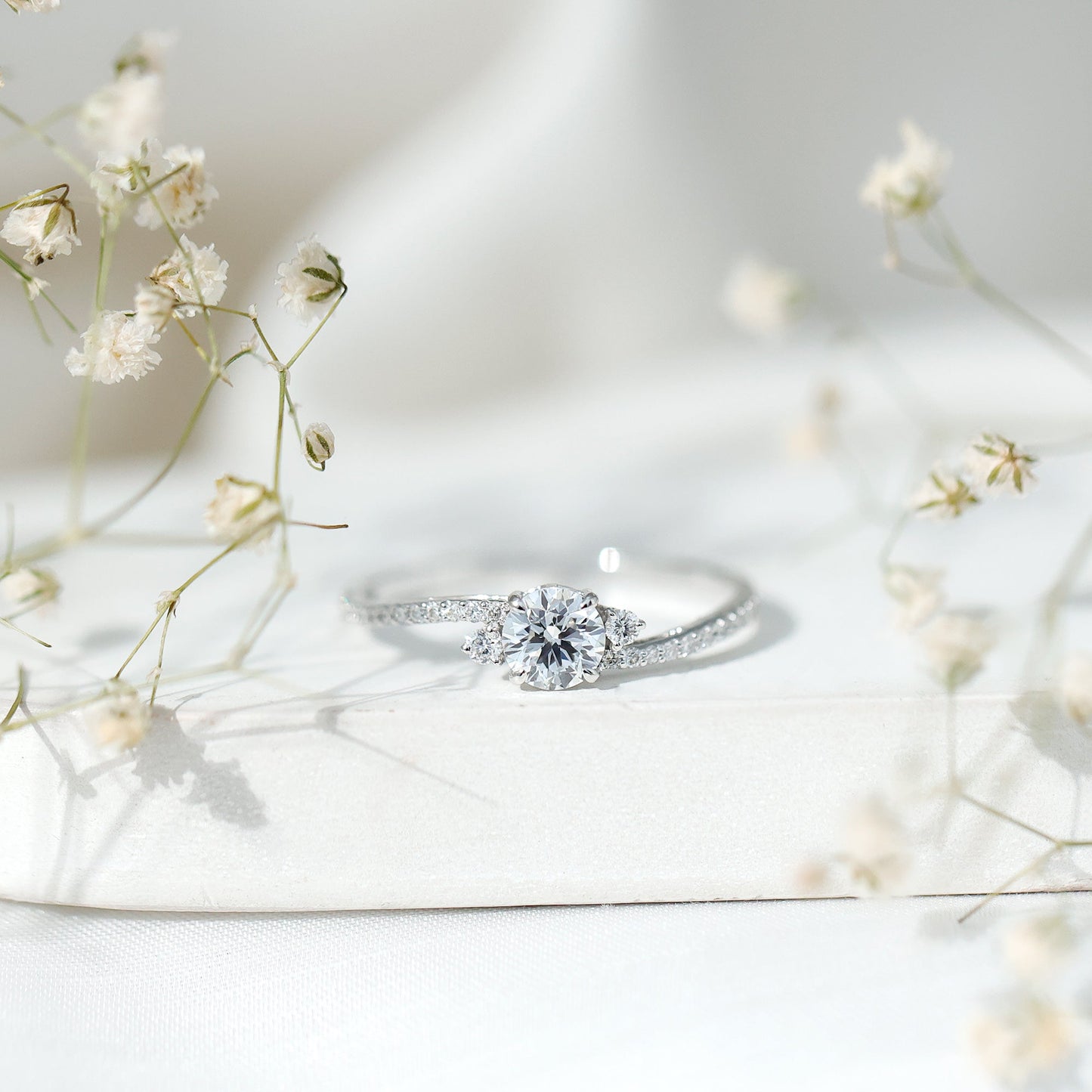 Round Shape Moissanite Bypass Engagement Ring with Side Stones