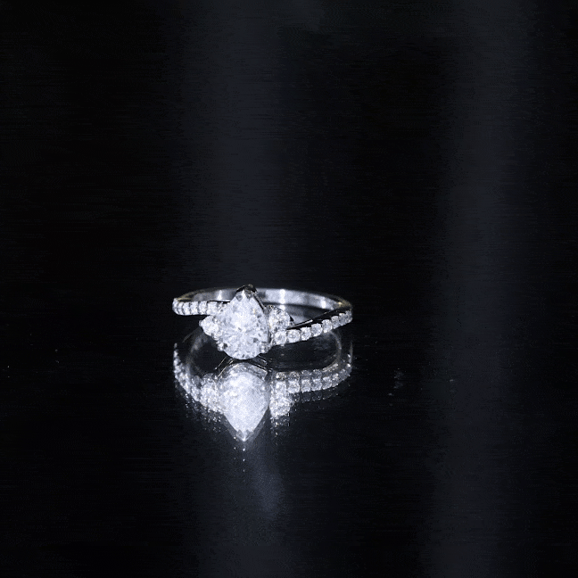 Pear Cut Moissanite Bypass Engagement Ring with Side Stones