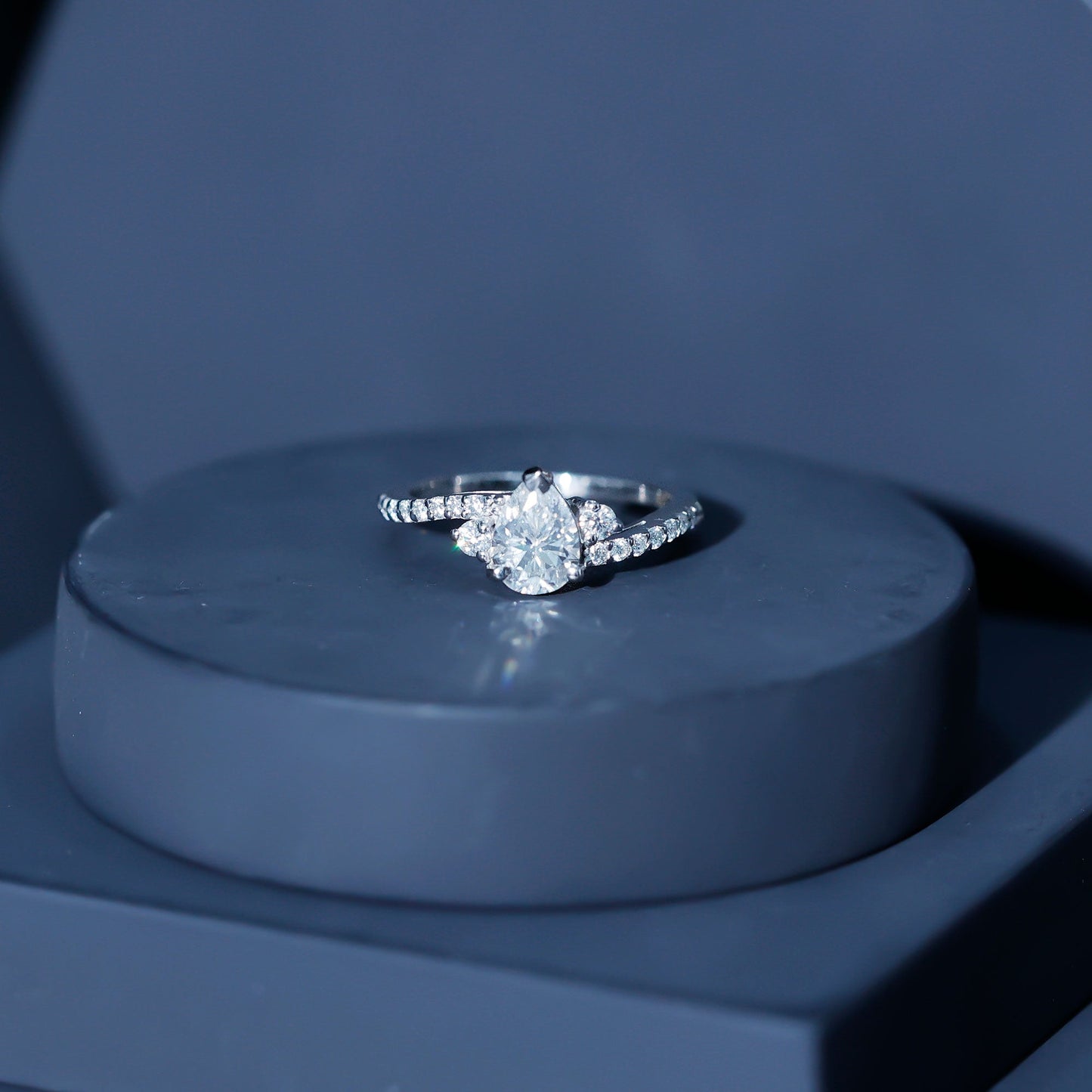 Pear Cut Moissanite Bypass Engagement Ring with Side Stones