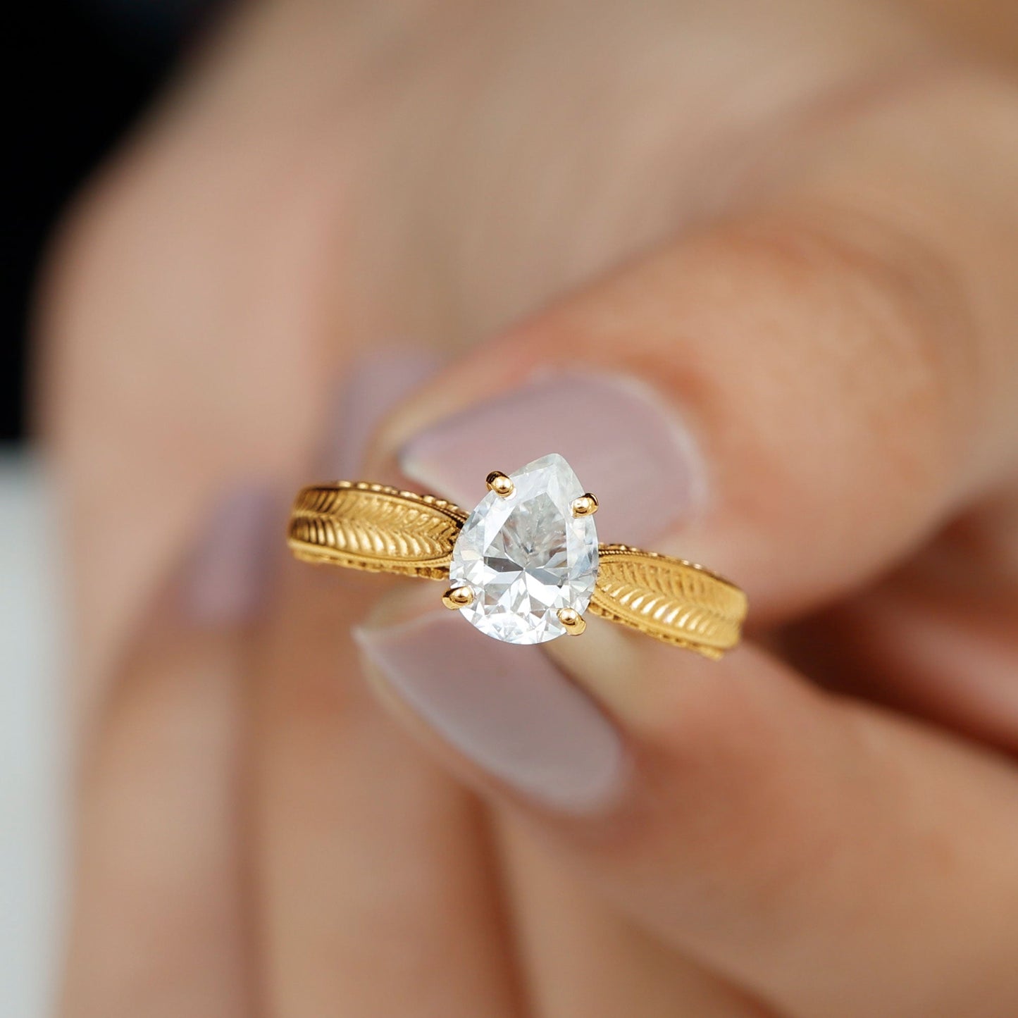 Claw Set Pear Shape Moissanite Engagement Ring