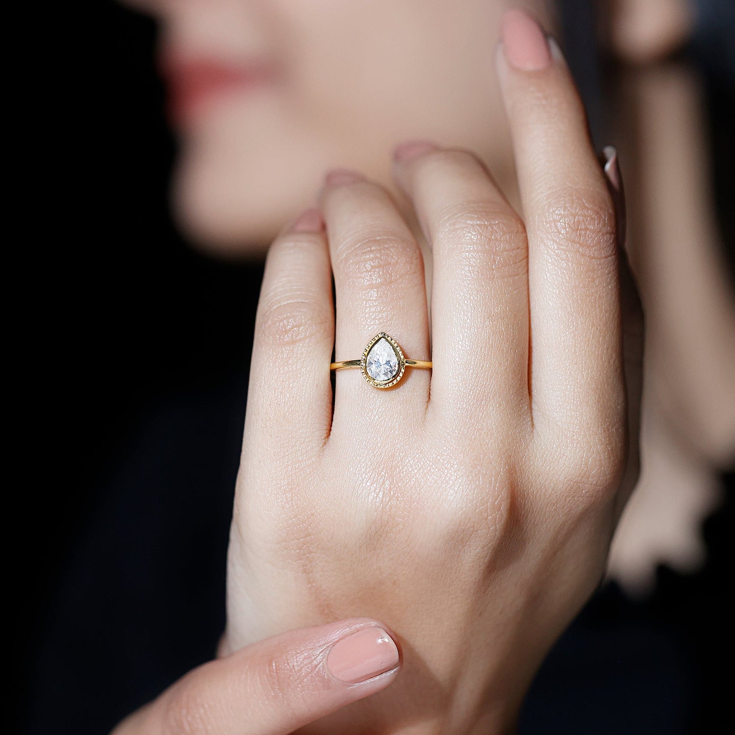 Pear Shaped Moissanite Solitaire Engagement Ring in Bezel Setting